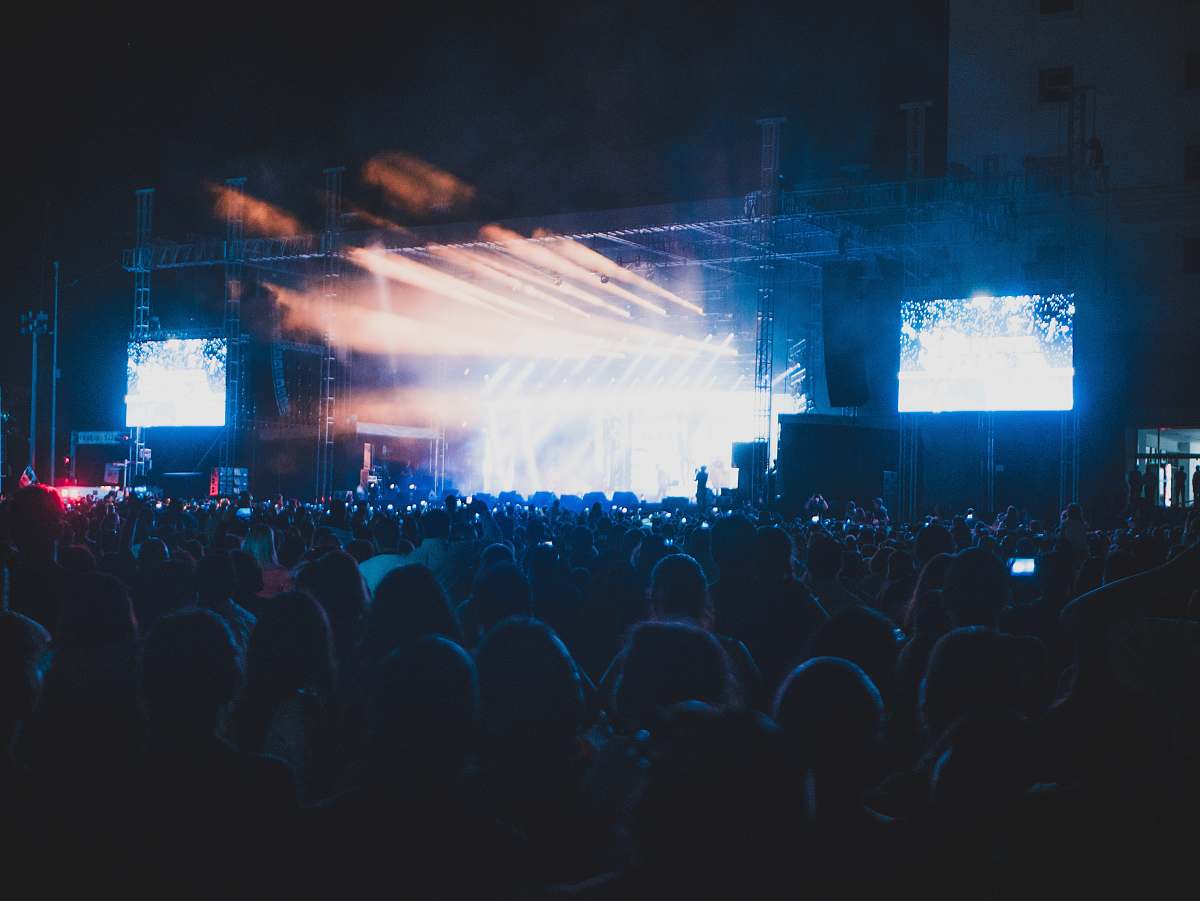 music band playing on stage crowd